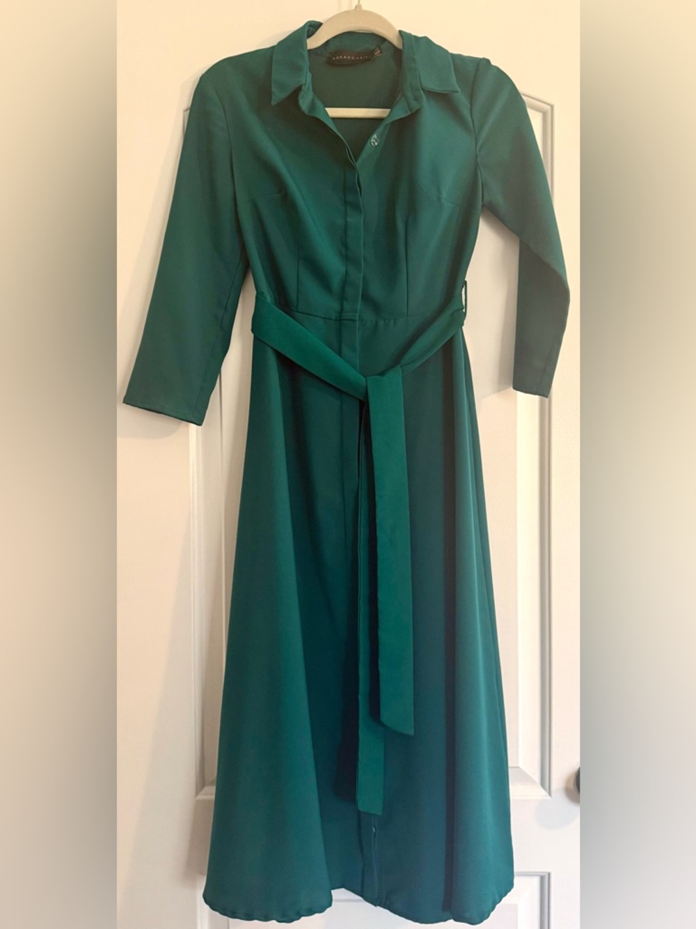 Emerald Green Dress
Size 2
Three Quarter sleeves - Picture 3 of 4